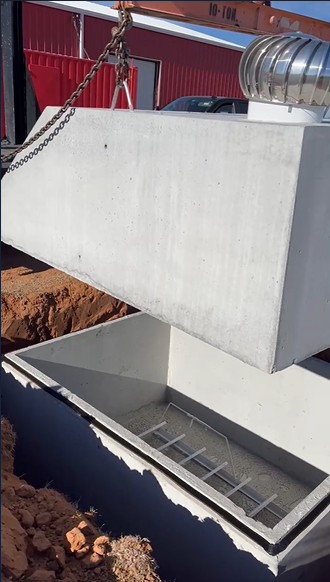 Lid placement on storm shelter in Aspermont, TX by Sheltris